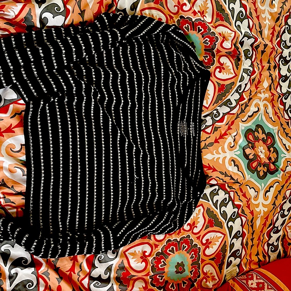a black and white striped sweater